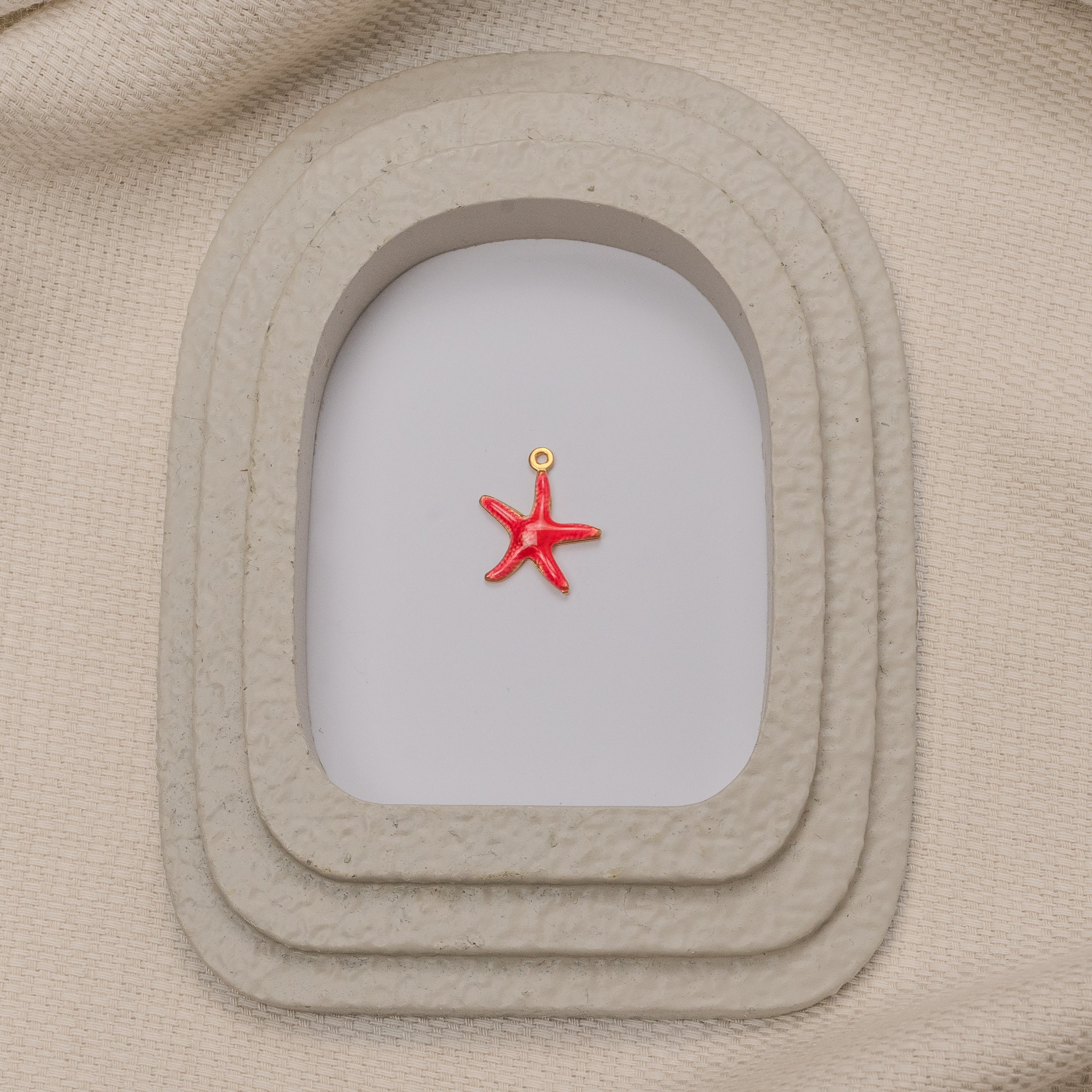 CHARM ÉTOILE DE MER ROSE