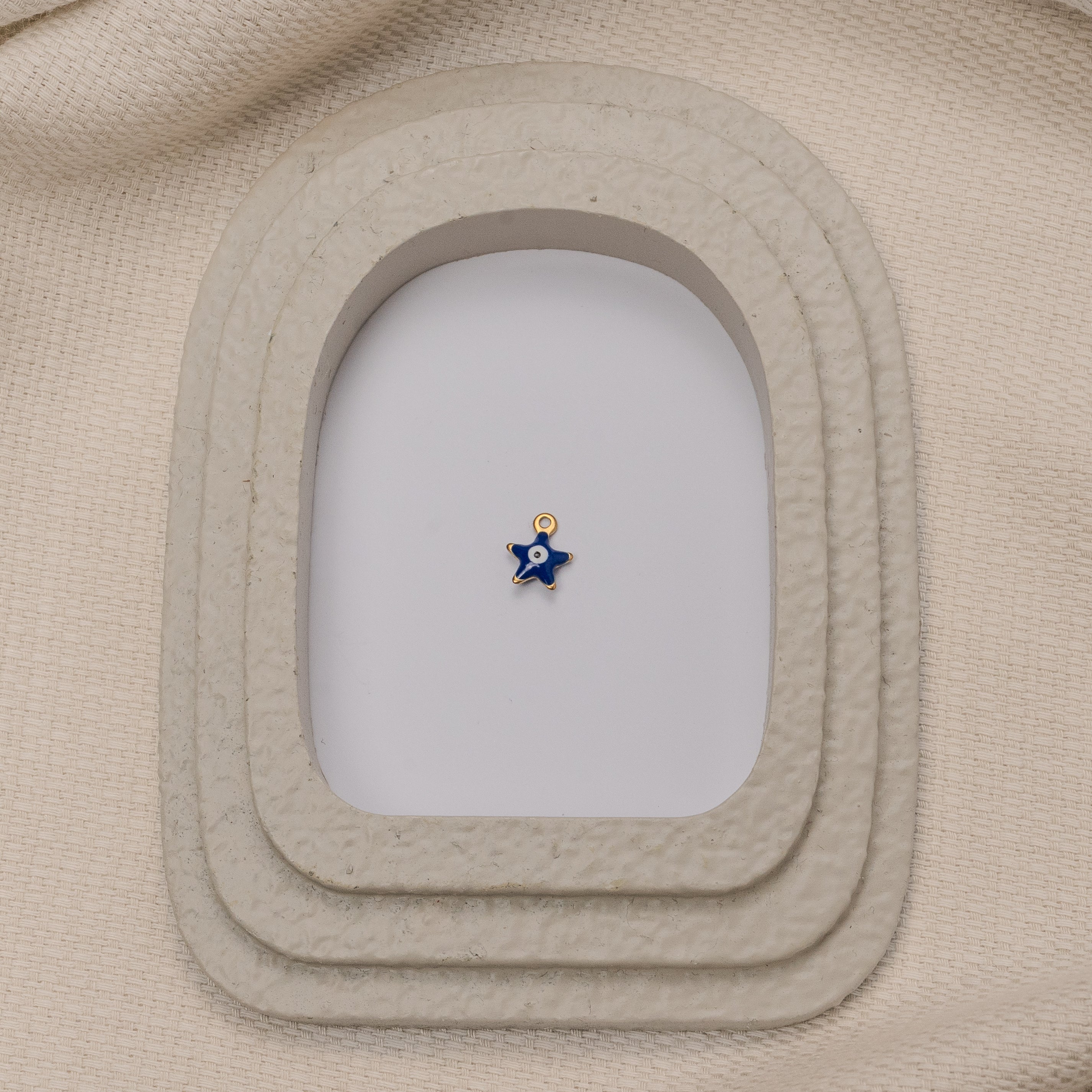 CHARM ÉTOILE ŒIL BLEUE ÉLECTRIQUE