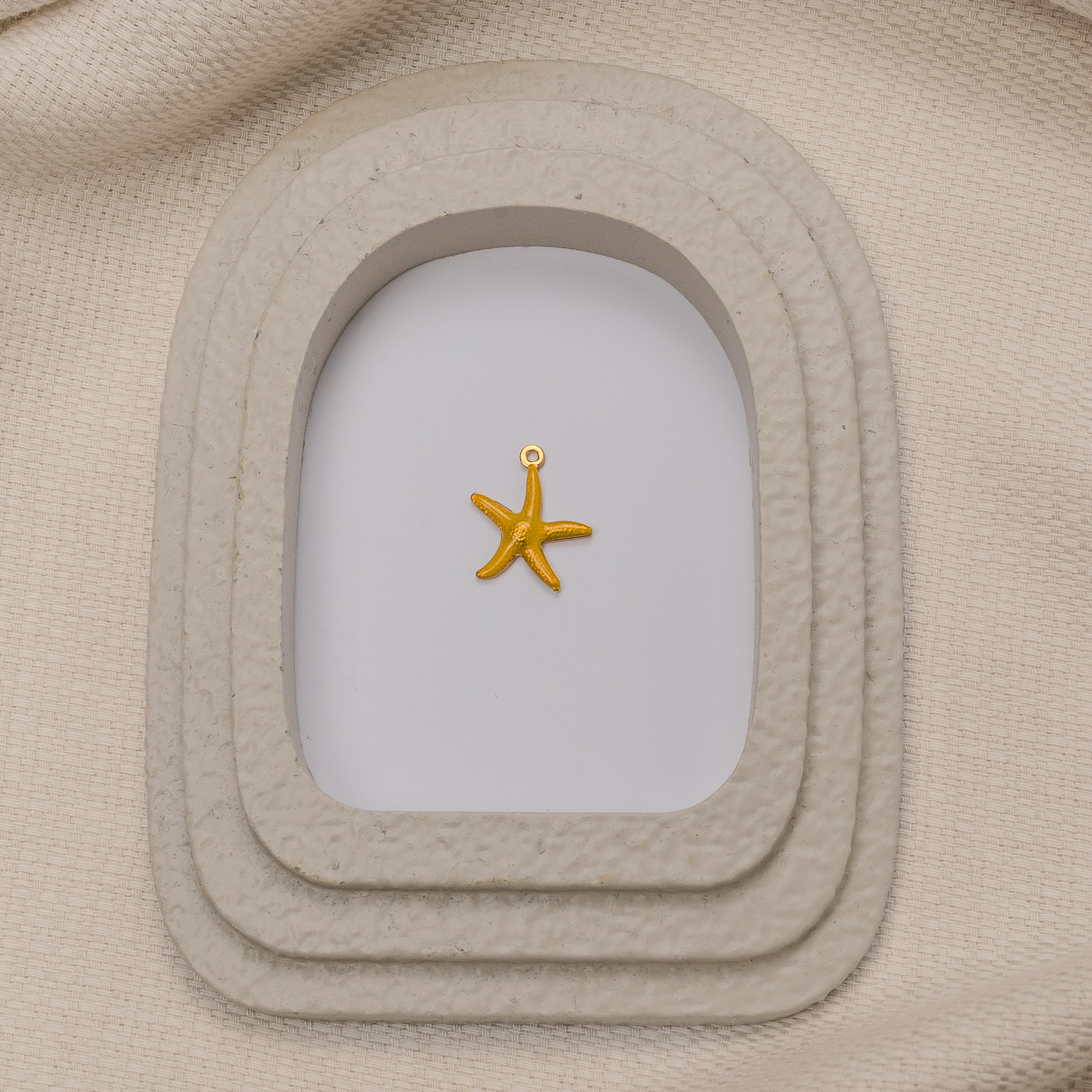 CHARM ÉTOILE DE MER JAUNE
